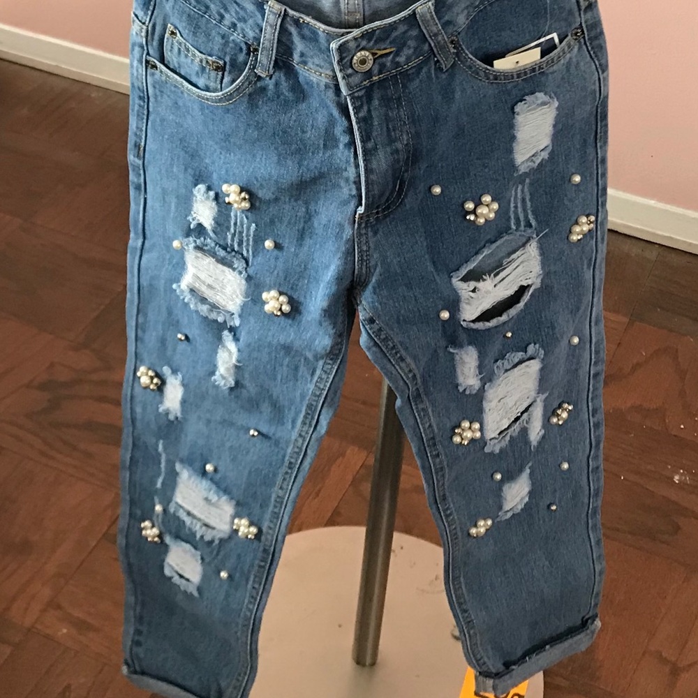 Distressed boyfriend jeans